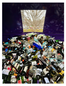 glass in recycling dumpster bin